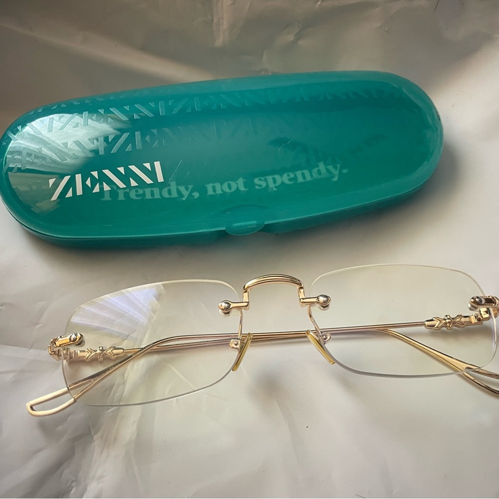 Chic Gold Rimless Glasses with Teal Case